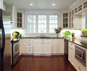 Phòng bếp sáng sủa và rộng rãi hơn khi tone chủ yếu sử dụng là tone trắng, sau sửa phòng bếp nhà ống.