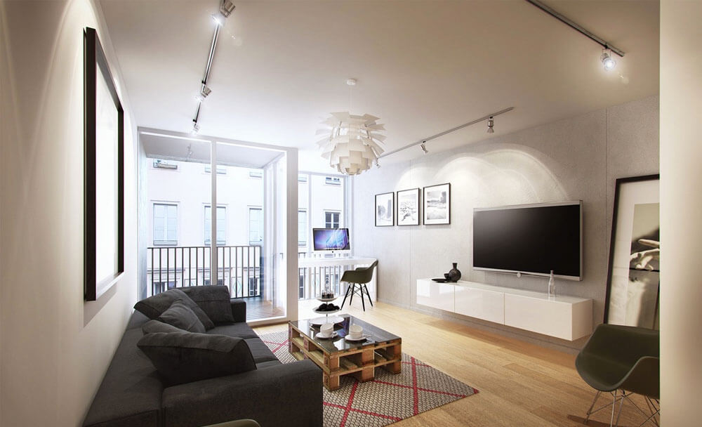 Sửa nhà với không gian phòng khách tông màu trung tính, kết hợp với bộ ghế sofa màu ghi lịch sự và sang trọng.